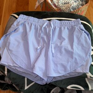 Periwinkle buff bunny lifesaver shorts with built in pockets and biker shorts